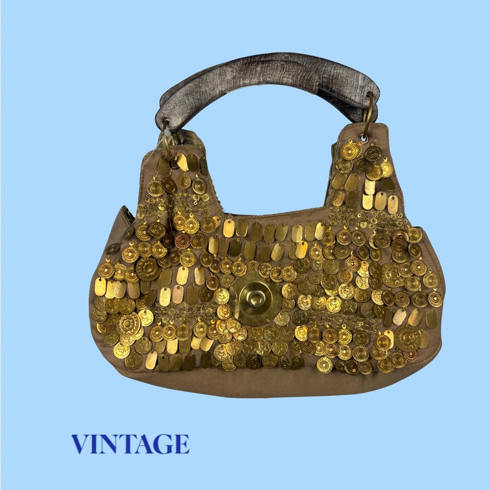 The Artisan Medallion Handbag